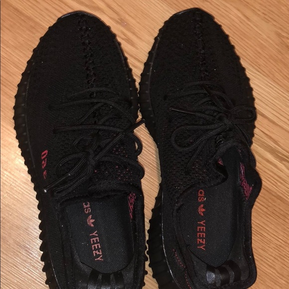 black yeezy red writing